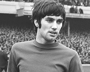 ** FILE ** Northern Ireland and Manchester United soccer player George Best stands on the pitch before a match at Highbury, London, in this Feb. 24, 1968 file photo. Soccer great Best is "desperately ill" but hanging on for survival, his doctor said Monday, Nov. 21, 2005. The 59-year-old Best, who needed a liver transplant three years ago after decades of alcohol abuse, is on life support in stable but critical condition at Cromwell Hospital in west London. (AP Photo/Peter Kemp) ** B/W ONLY **