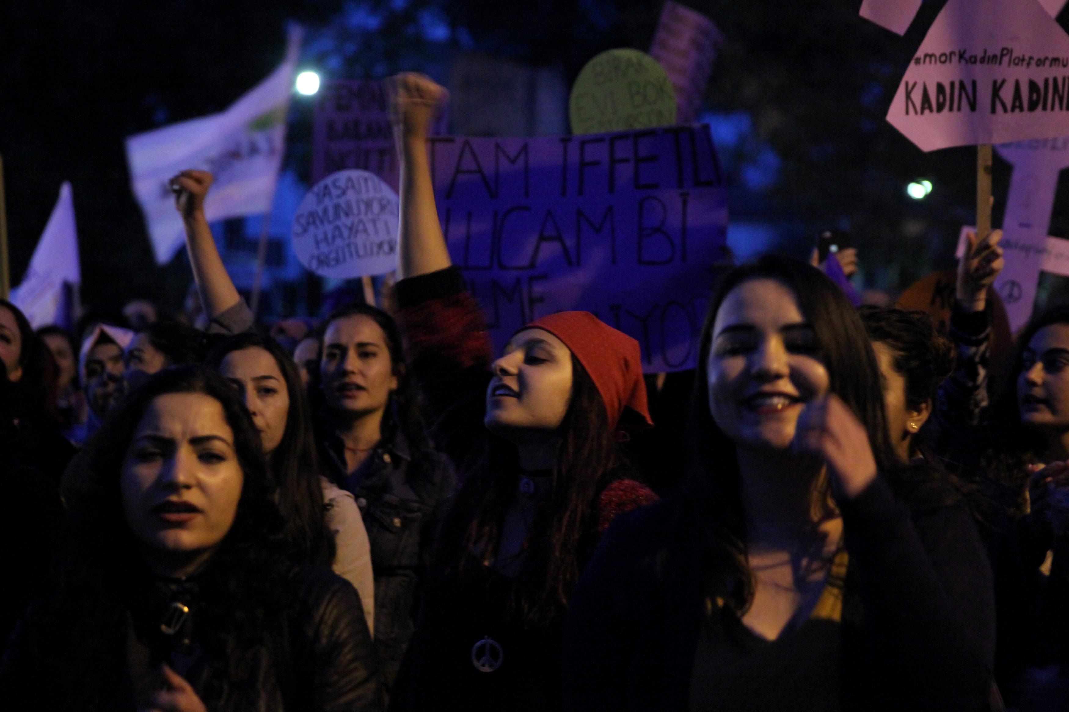 Greek Cypriots and Turkish Cypriots participate in a peace rally marking the international Women's Day inside the UN-controlled buffer zone of Nicosia, Cyprus March 8, 2017. REUTERS/Yiannis Kourtoglou