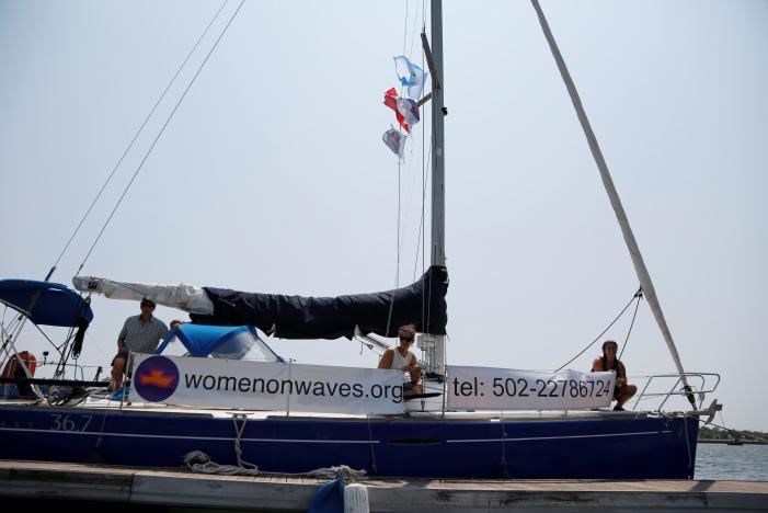 Members of Women on Waves, a Dutch non-profit that provides abortion services beyond the territorial waters of countries where abortion is illegal, are seen on their ship at a pier in Puerto de San Jose, Guatemala February 23, 2017. REUTERS/Luis Echeverria